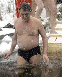 Ukrainian President Viktor Yushchenko takes a dip in the icy-cold water of the Dnipro river in Kyiv, Ukraine, on Jan. 19.  The cold snap coincided with the Ukrainian Orthodox holiday known as the Epiphany. Many Ukrainians mark this annual holiday with a ritual that involves jumping into holes cut into thick ice on rivers and ponds to cleanse themselves with water deemed holy for the day. The tradition imitates the baptism of Jesus in the River Jordan.